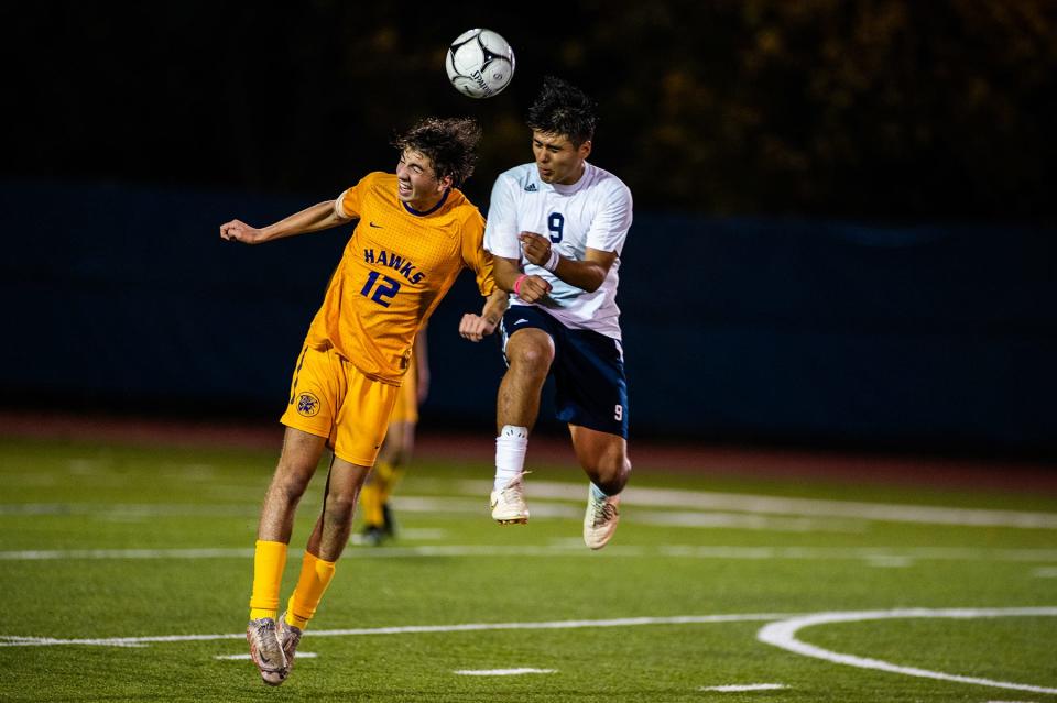 Rhinebeck's Malcolm Steward, left, heads the ball with Mount Academy's Martin Mendoza during the Section 9 class C boys soccer championship game in Middletown, NY on Tuesday, October 25, 2022. Rhinebeck defeated Mount Academy 1-0 in double overtime. KELLY MARSH/FOR THE TIMES HERALD-RECORD