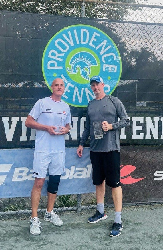 Will Calhoun, left, and Jay Harris, ranked No. 1 in the nation in 50-and-over doubles, after winning two titles recently as a tournament in Providence, Rhode Island.