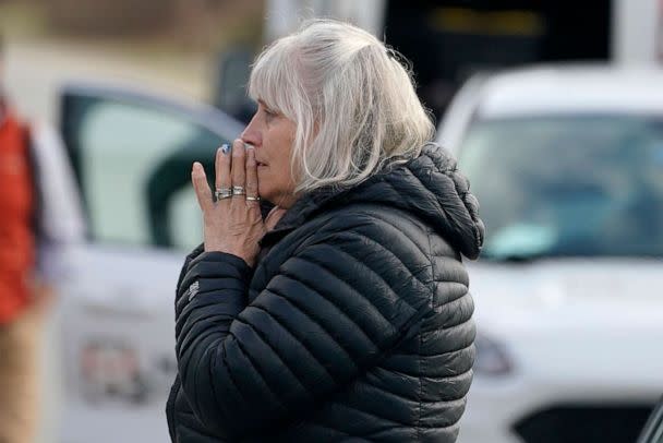 PHOTO: A woman reacts at the scene of a multiple shooting, April 18, 2023, in Bowdoin, Maine. (Robert F. Bukaty/AP)