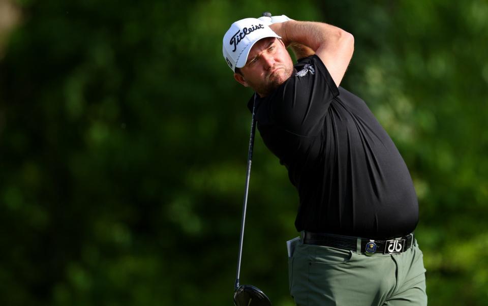  Justin Rose of England reacts after making a birdie from a bunker at the seventh green during the first round of the 2023 PGA Championship - Andrew Redington/Getty Images