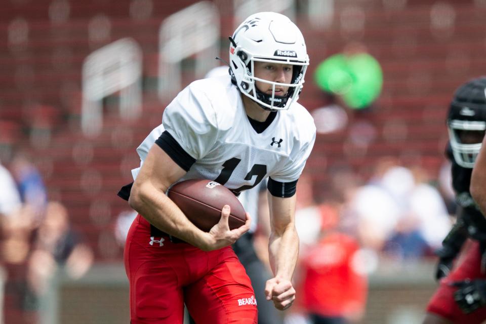 Cincinnati Bearcats quarterback Brady Drogosh (12) runs toward the end zone during the Cincinnati Bearcats spring scrimmage at Nippert Stadium on Saturday, April 15, 2023.