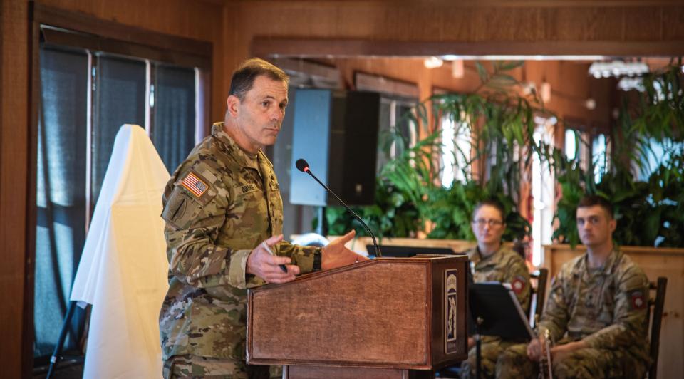 Lt. Gen. Chris Donahue, 18th Airborne Corps commander, provides remarks during the redesignation ceremony of Schoomaker Road and Beckwith Lodge.