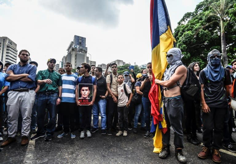 Venezuela opposition leader Henrique Capriles joins a march paying tribute to student Juan Pablo Pernalete killed during a protest against President Nicolas Maduro