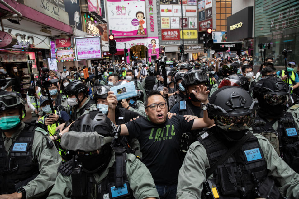 2020年5月24日，市民在香港島一帶發起反對國安法及國歌法遊行，人民力量副主席譚得志被捕。