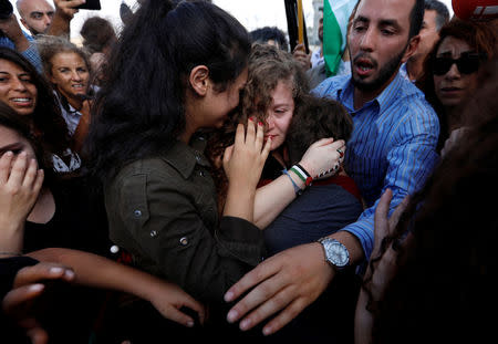 Palestinian teenager Ahed Tamimi is welcomed by relatives and supporters after she was released from an Israeli prison, at Nabi Saleh village in the occupied West Bank July 29, 2018. REUTERS/Mohamad Torokman