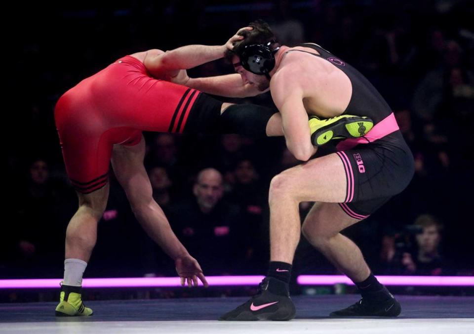 Penn State’s Lucas Cochran pulls in Rutgers’ Yara Slavikouski in the 285 lb bout of the match on Monday, February. 12, 2024 at the Bryce Jordan Center.