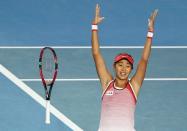 China's Zhang Shuai celebrates after winning her fourth round match against Madison Keys of the U.S. at the Australian Open tennis tournament at Melbourne Park, Australia, January 25, 2016. REUTERS/Issei Kato