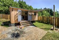 <p>Surrounded by peaceful, bucolic farmland in Somerset, England, the <a href="http://www.theshepherdshutretreat.co.uk/" rel="nofollow noopener" target="_blank" data-ylk="slk:Shepherds Hut Retreat;elm:context_link;itc:0;sec:content-canvas" class="link ">Shepherds Hut Retreat</a> is comprised of four tiny "huts" available for rent. Each structure overlooks a nearby pond, and includes its own private deck and fire pit. Inside the 20- by eight-foot huts, you'll find a fully functioning kitchen, a bathroom, a dining area, and a built-in bed. Rental rates start from around $243 per weekend.</p><p><a class="link " href="https://go.redirectingat.com?id=74968X1596630&url=https%3A%2F%2Fwww.tripadvisor.com%2FHotel_Review-g666345-d4859719-Reviews-The_Shepherds_Hut_Retreat-Crewkerne_Somerset_England.html&sref=https%3A%2F%2Fwww.countryliving.com%2Fhome-design%2Fg1887%2Ftiny-house%2F" rel="nofollow noopener" target="_blank" data-ylk="slk:PLAN YOUR TRIP;elm:context_link;itc:0;sec:content-canvas">PLAN YOUR TRIP</a> <a class="link " href="http://www.theshepherdshutretreat.co.uk/the-huts/" rel="nofollow noopener" target="_blank" data-ylk="slk:SEE INSIDE;elm:context_link;itc:0;sec:content-canvas">SEE INSIDE</a></p>