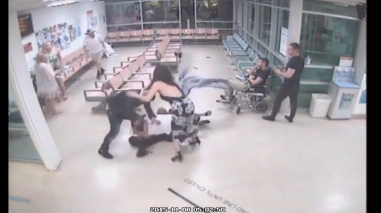 The man charges at another in the waiting room before throwing multiple punches. Photo: YouTube