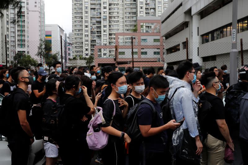 The Wider Image: On trial on riot charges, Hong Kong newlyweds prepared for life apart