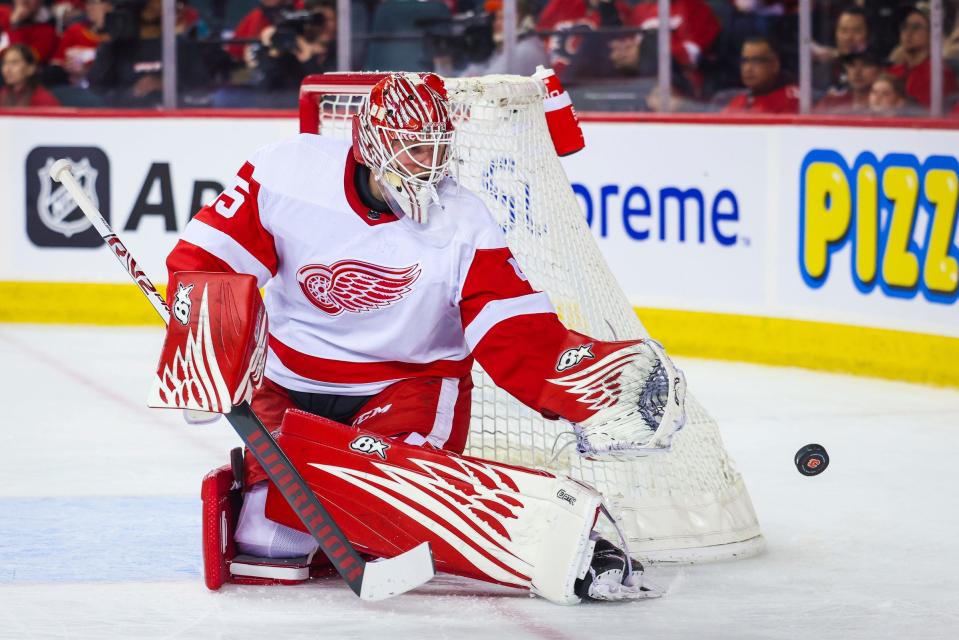 Detroit Red Wings goaltender Magnus Hellberg (45) guards his net against the Calgary Flames during the first period at Scotiabank Saddledome in Calgary, Alberta, on Thursday, Feb. 16, 2023.