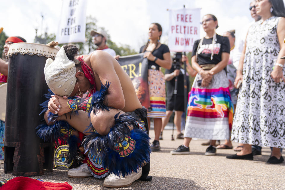 People gather for a rally outside of the White House in support of imprisoned Native American activist Leonard Peltier, Tuesday, Sept. 12, 2023, in Washington. (AP Photo/Stephanie Scarbrough)