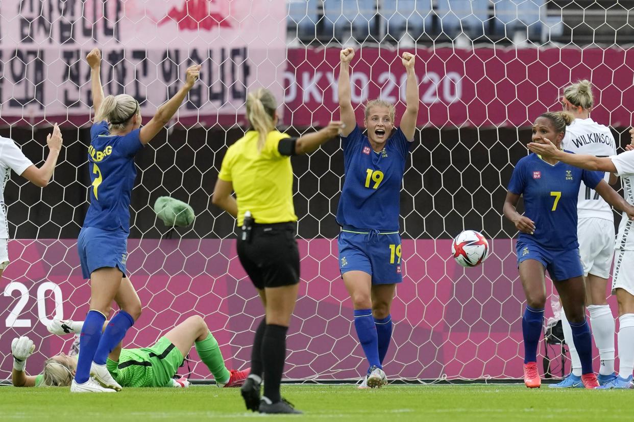Sweden's Anna Anvegard (19) celebrates after scoring on a header against New Zealand during a women's soccer match between New Zealand and Sweden at the 2020 Summer Olympics, Tuesday, July 27, 2021, in Rifu, Japan.