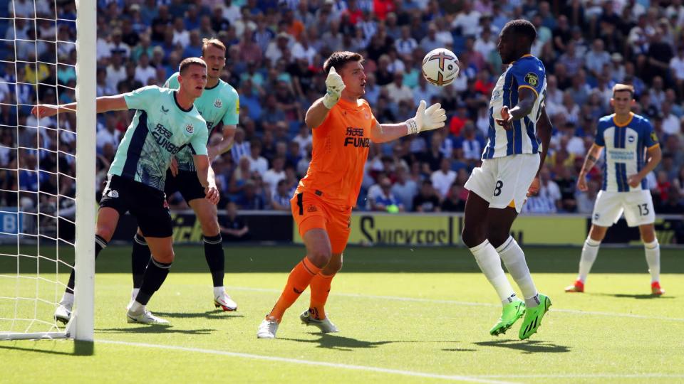 Newcastle keeper Nick Pope saves from Brighton striker Danny Welbeck. Credit: PA Images