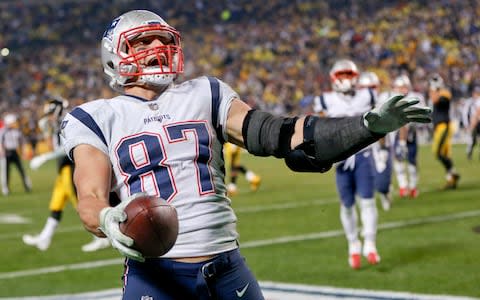 New England Patriots tight end Rob Gronkowski (87) plays against the Pittsburgh Steelers, in an NFL football game, in Pittsburgh. The New England tight end has dominated the Steelers throughout his career, no matter how Pittsburgh opts to defend him - Credit: AP