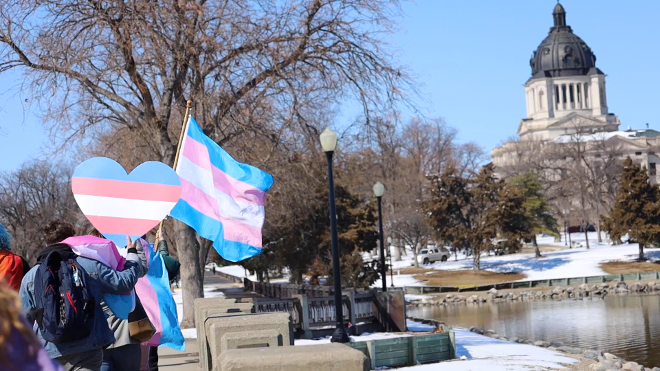 Transgender rights advocates protest at Gov. Kristi Noem's mansion and at the Capitol in Pierre, S.D., on March 11.