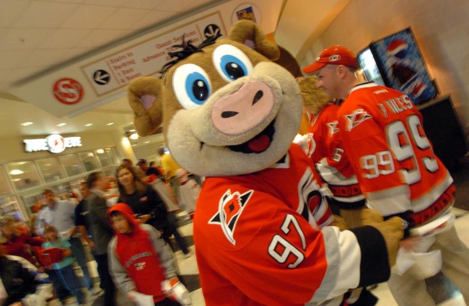 Stormy, the Carolina Hurricanes mascot, greets fans on the concourse before the final regular season game against Buffalo Tuesday evening 4/18/06.