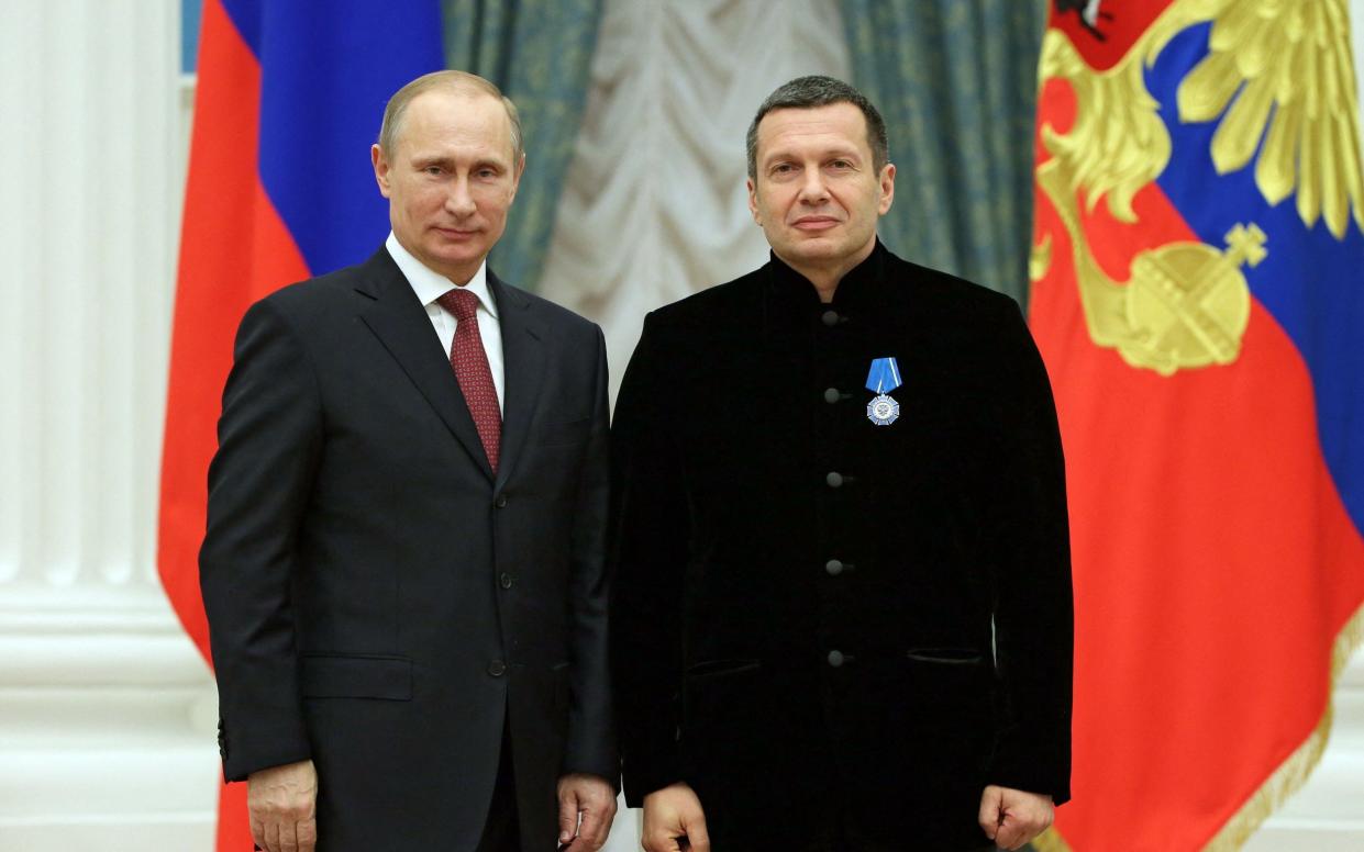 TV anchor Vladimir Solovyov with Vladimir Putin - Mikhail METZEL/SPUTNIK/AFP