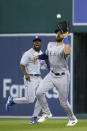 Texas Rangers right fielder Joey Gallo catches a fly ball hit by Detroit Tigers' Akil Baddoo, with center fielder Adolis Garcia, left, backing up the play during the fifth inning of a baseball game Tuesday, July 20, 2021, in Detroit. (AP Photo/Duane Burleson)