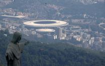 FILE PHOTO: An aerial view shows the Christ the Redeemer statue with the Maracana stadium during the coronavirus disease (COVID-19) outbreak, in Rio de Janeiro