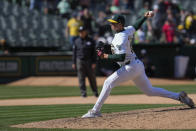 Oakland Athletics' Mason Miller pitches to a Washington Nationals batter during the ninth inning of a baseball game Sunday, April 14, 2024, in Oakland, Calif. (AP Photo/Godofredo A. Vásquez)