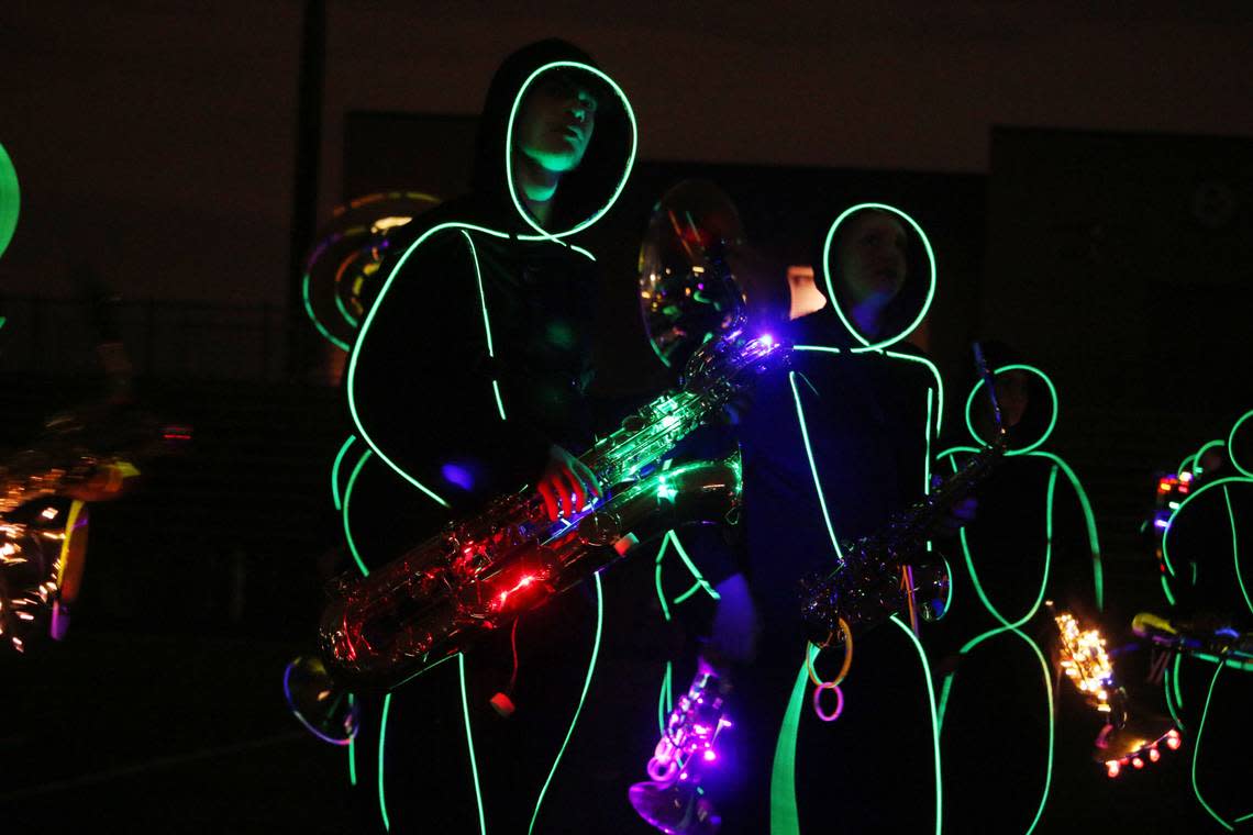 Aiden Johnson plays his part in the Blue Valley Northwest marching band’s Glow Show.