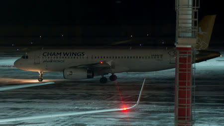 A Cham Wings aircraft is seen at Rostov Airport in Russia, January 17, 2018. Picture taken January 17, 2018. REUTERS/Stringer