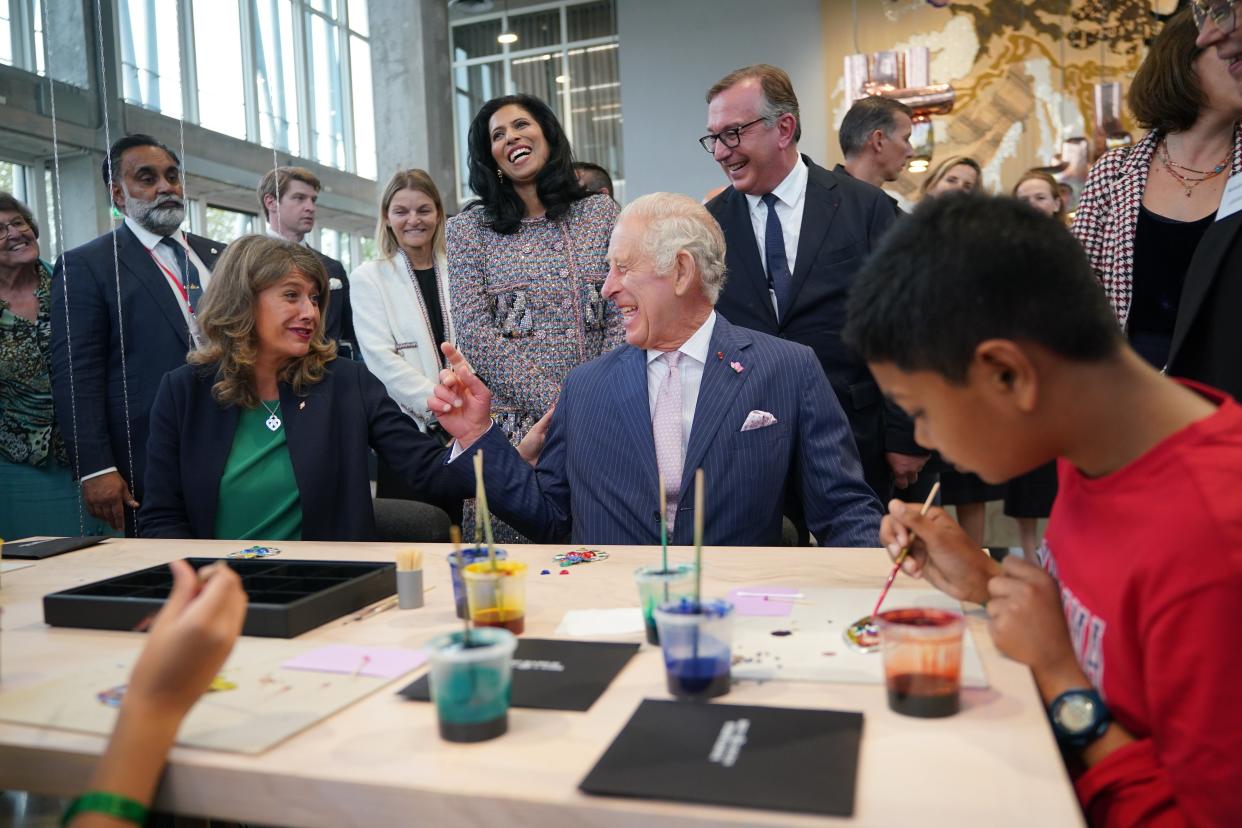 King Charles III crafts with the Mayor of Aubervilliers, Karine Franclet, students and artisans (Yui Mok/PA Wire)