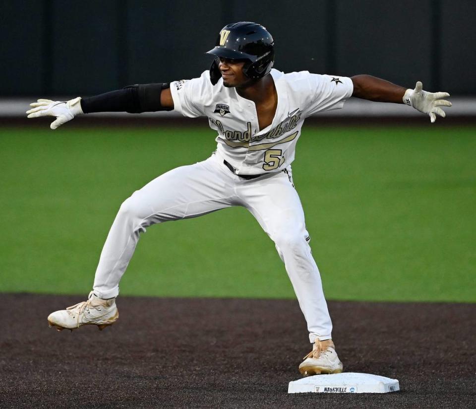 Vanderbilt’s Enrique Bradfield Jr. (51) celebrates after hitting a double to right field against Eastern Illinois in the third inning of an NCAA college baseball tournament regional game Friday, June 2, 2023, in Nashville, Tenn.