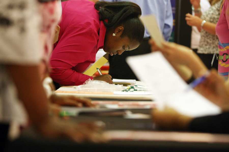 Shawneeka Woodard fills out a job form at the Diversity Job Fair at the Affinia Hotel June 10, 2008 in New York City. (Photo by Mario Tama/Getty Images)