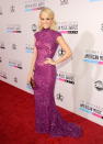 Carrie Underwood arrives on the 2012 American Music Awards red carpet.