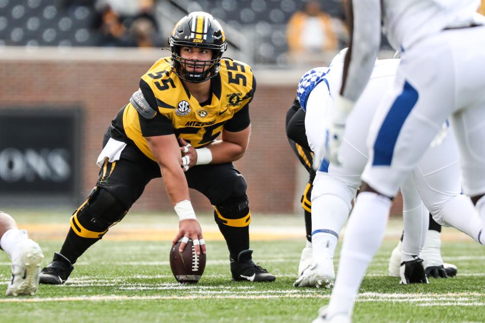 Missouri center Mike Maietti (55) prepares to snap the ball during a game against Kentucky on Oct. 24 at Faurot Field.