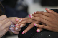 <p>Trippy bright-pink tips bring this fashion week nail art to life. (Photo by Mireya Acierto/Getty Images) </p>