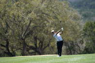 Si Woo Kim hits a fairway shot on the sixth hole in the second round of the Dell Technologies Match Play Championship golf tournament, Thursday, March 24, 2022, in Austin, Texas. (AP Photo/Tony Gutierrez)