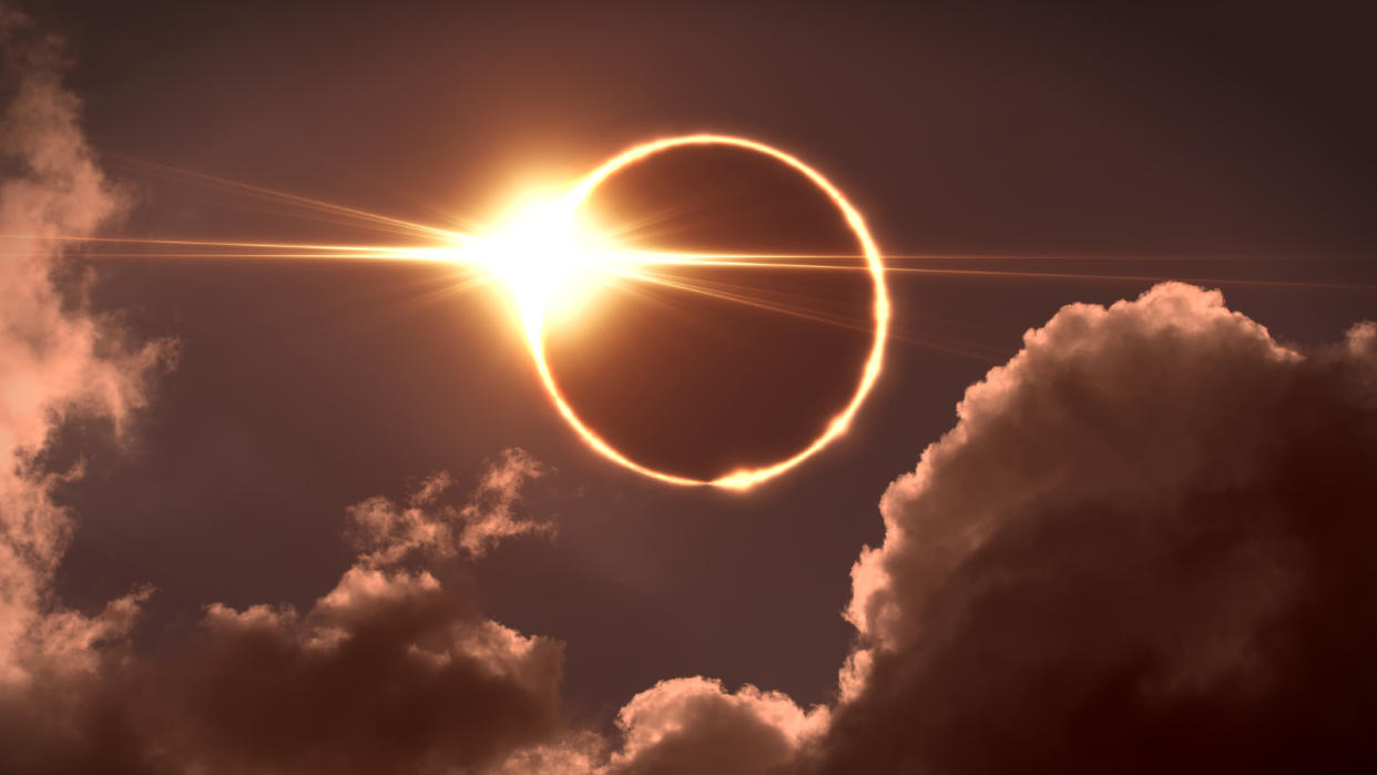  The sun remerged from behind the moon during a solar eclipse. 