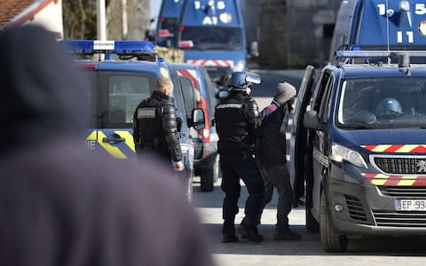 A number of the protesters resisting eviction were detained by police - Credit:  JEAN-CHRISTOPHE VERHAEGEN/ AFP