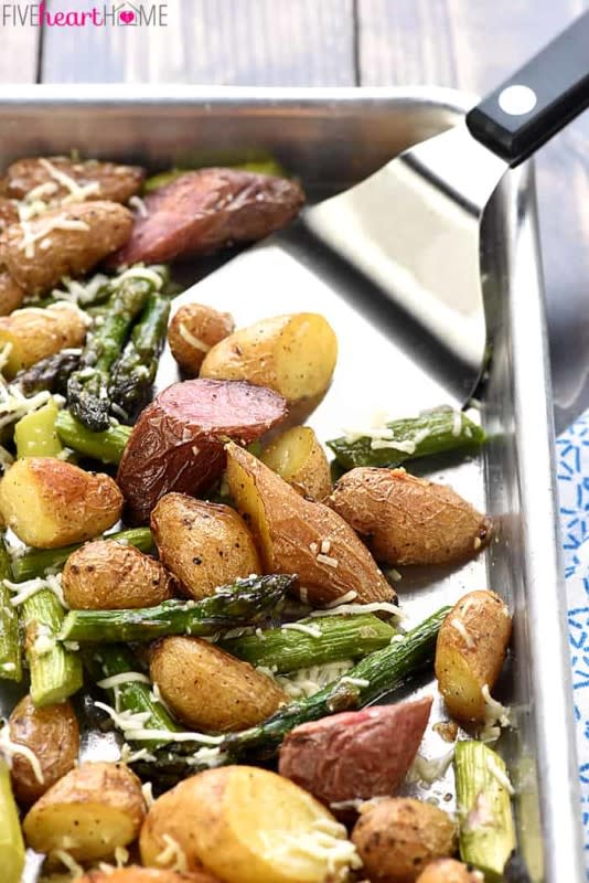 <p>Five Heart Home</p><p>This one-pan side dish is perfect for any weeknight or holiday meal. </p><p><strong>Get the recipe: <a href="https://www.fivehearthome.com/roasted-potatoes-asparagus-with-garlic-cheese-side-dish-recipe/" rel="nofollow noopener" target="_blank" data-ylk="slk:Cheesy Garlic Roasted Potatoes and Asparagus;elm:context_link;itc:0;sec:content-canvas" class="link ">Cheesy Garlic Roasted Potatoes and Asparagus</a> </strong></p><p><strong>Related: <a href="https://www.yahoo.com/lifestyle/45-easy-easter-desserts-try-211038459.html" data-ylk="slk:45+ Easy Easter Desserts & Recipes;elm:context_link;itc:0;sec:content-canvas;outcm:mb_qualified_link;_E:mb_qualified_link;ct:story;" class="link  yahoo-link">45+ Easy Easter Desserts & Recipes</a></strong></p>