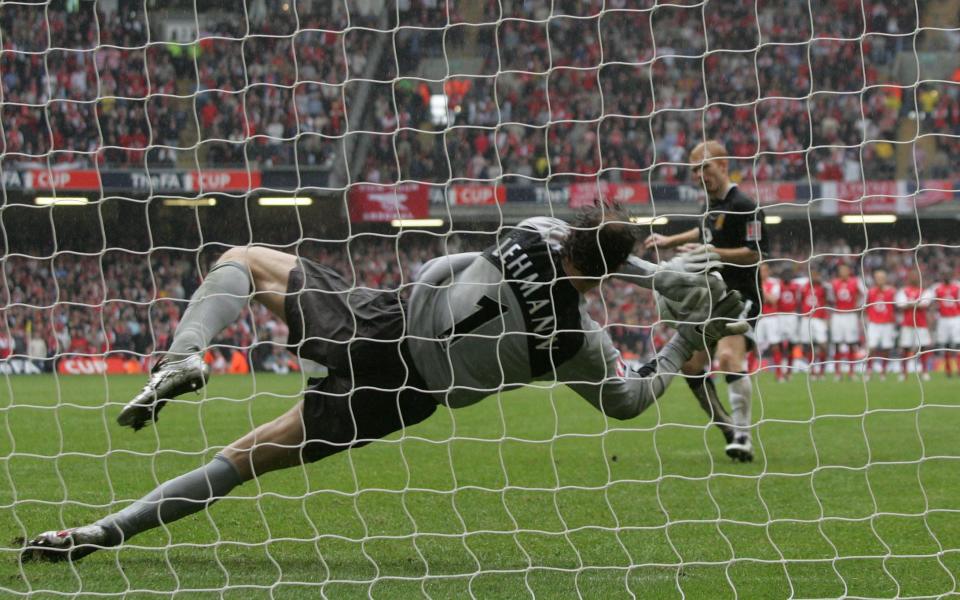 Jens Lehmann saves from Paul Scholes