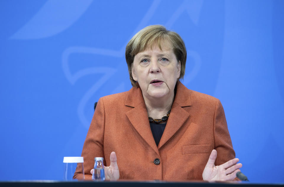 After the switching conference between her and the prime ministers of the federal states, Chancellor Angela Merkel (CDU) comments on the further procedure in the Corona crisis at a press conference in the Federal Chancellery, on Sunday, Dec.13, 2012. (Bernd von Jutrczenka/dpa via AP)