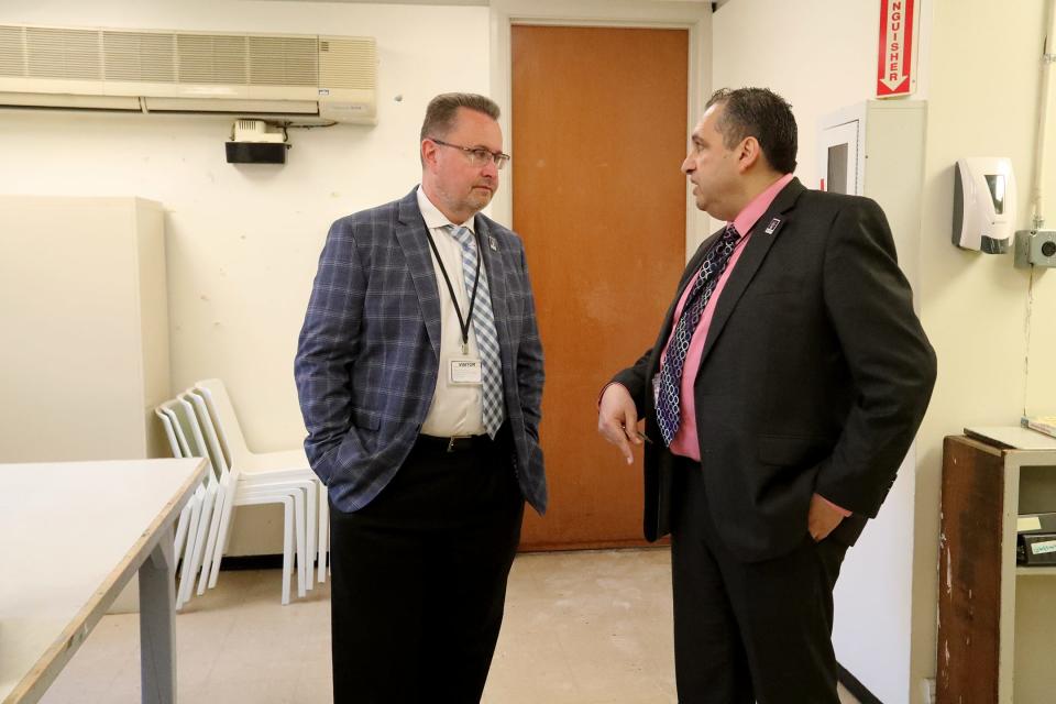 Georgia Department Behavioral Health and Developmental Disabilities Commissioner Kevin Tanner, left, talks with Dr. Reemon Bishara during a tour of the future transitional unit for Operation New Hope at Georgia Regional in Savannah.