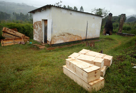 Coffins are seen outside a mortuary at Chimanimani rural district hospital after Cyclone Idai, in Chimanimani, Zimbabwe, March 23, 2019. REUTERS/Philimon Bulawayo
