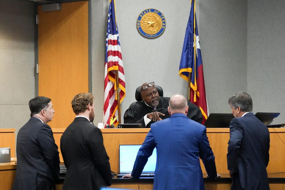 Judge Clifford Brown speaks with the defense and prosecution Tuesday during Daniel Perry's sentencing hearing. Brown is expected to announce the sentence at 10 a.m. Wednesday,