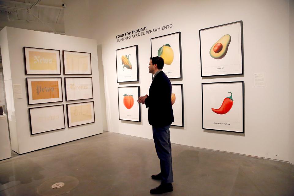 Jeremiah Matthew Davis talks about paintings during a preview of the Art of Food at Contemporary of Arts Center in Oklahoma City, Wednesday, Feb.8, 2023. 