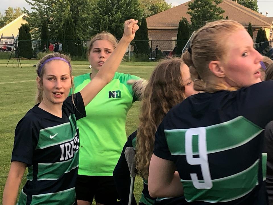 Notre Dame High School midfielder Parker Miller (left) scored a goal late in the first half to give the Irish a halftime lead during the IHSA Class 2A Notre Dame Sectional girls soccer title match on Friday, May 27, 2022.