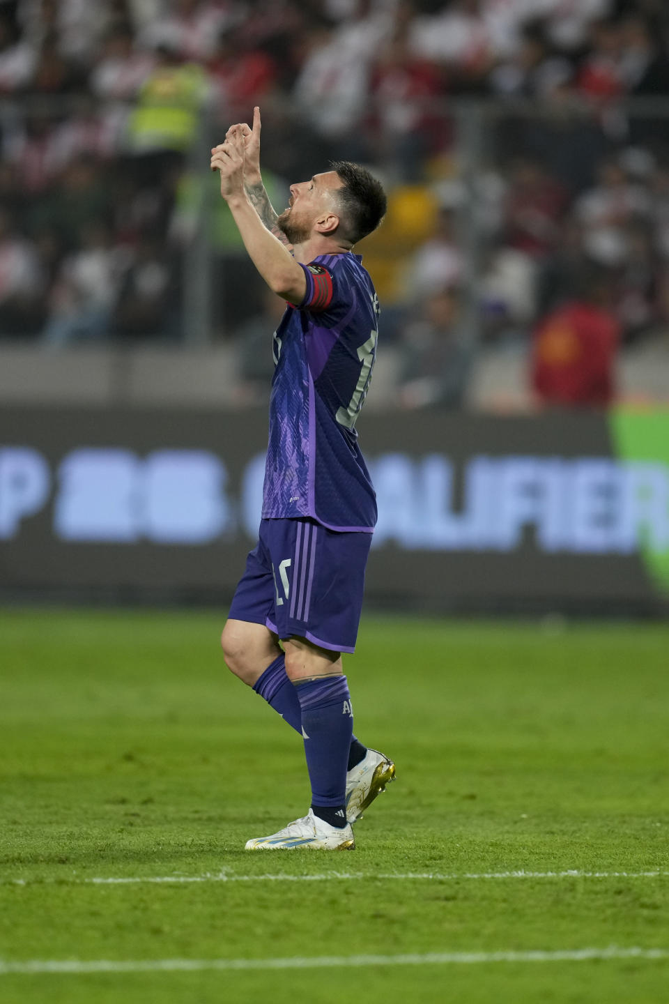 Argentina's Lionel Messi celebrates scoring his side's second goal against Peru during a qualifying soccer match for the FIFA World Cup 2026 at the National stadium in Lima, Peru,Tuesday, Oct. 17, 2023.(AP Photo/Martin Mejia)