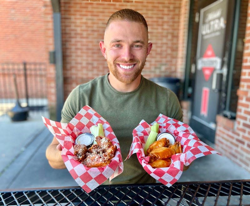 Austin Yochus prepares to dive into one of his favorite Super Bowl snacks.