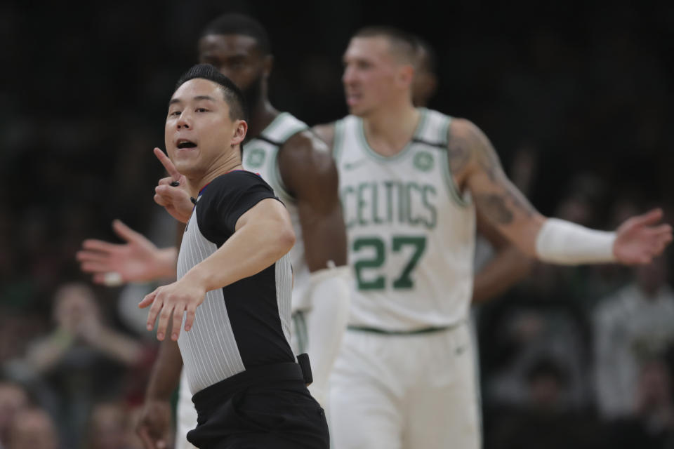 Referee Evan Scott ejects Boston Celtics guard Kemba Walker during the third quarter of an NBA basketball game against the San Antonio Spurs, Wednesday, Jan. 8, 2020 in Boston. (AP Photo/Charles Krupa)