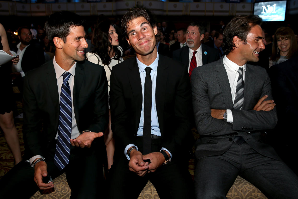 Novak Djokovic of Serbia, Rafael Nadal of Spain and Roger Federer of Switzerlan wait to go on stage during the ATP Heritage Celebration on Aug. 23, 2013. (Matthew Stockman/Getty Images)
