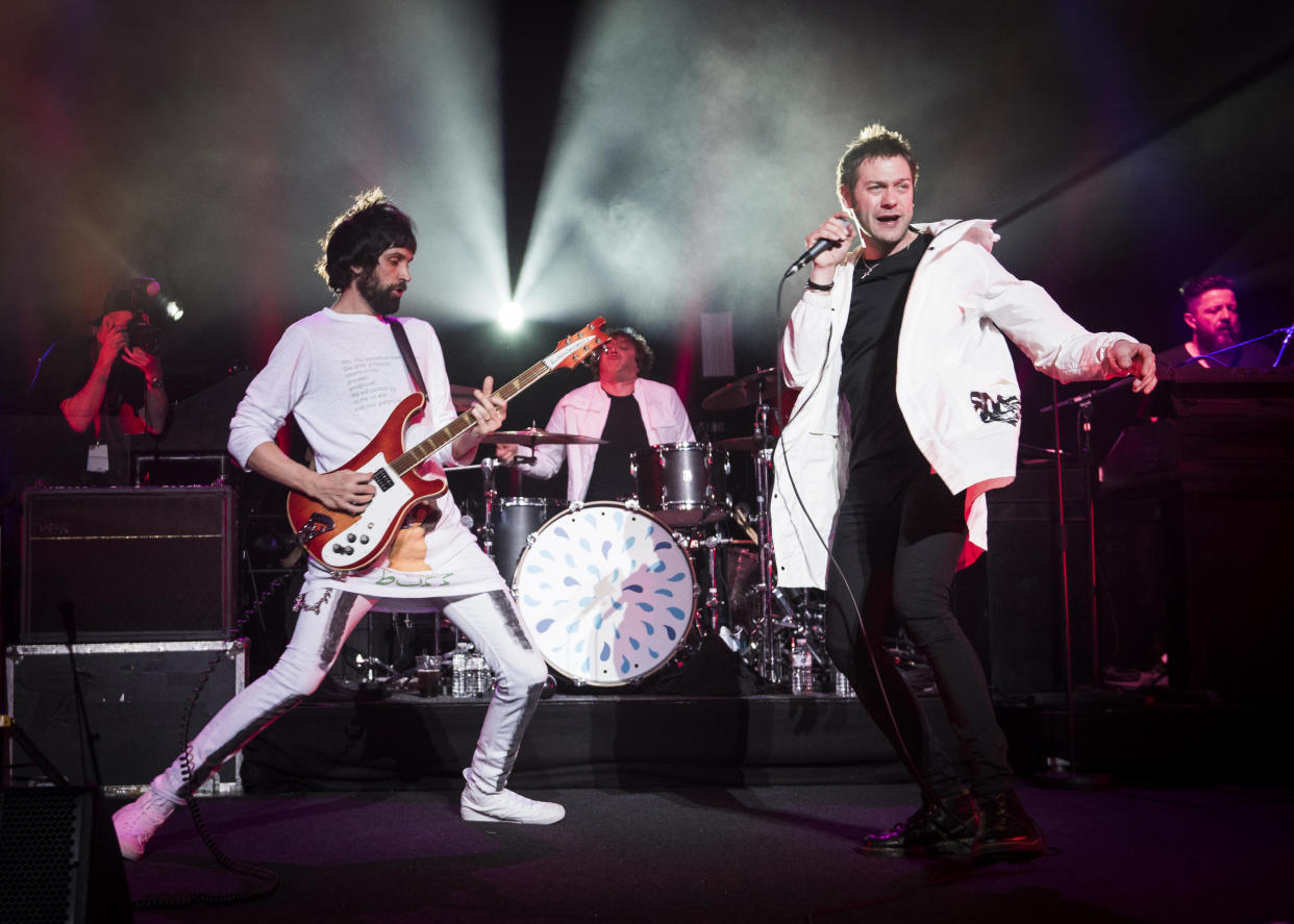 Sergio Pizzorno and Tom Meighan from Kasabian on stage during the Teenage Cancer Trust annual concert series, at the Royal Albert Hall, London.