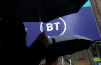 Logo of British Telecom (BT) is displayed outside a store in London